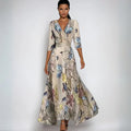 Bloemenprint wikkeljurk met V-hals en tailleband – Emilia