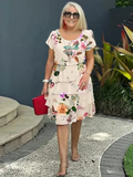 Maxi bloemenjurk met afslankend watervaldesign – Noémie