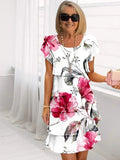 Maxi bloemenjurk met afslankend watervaldesign – Noémie