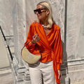 Oranje damespullover met vetersluiting – Emma