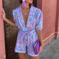 Dames jumpsuit met tailleband en zomerse elegantie – Lorena
