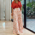 Tweedelige dames set met V-hals top en wijde broek – Mila