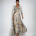 Bloemenprint wikkeljurk met V-hals en tailleband – Emilia