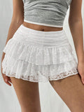 Kanten minirok met ruches en ingebouwd shortje – Melina