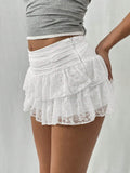 Kanten minirok met ruches en ingebouwd shortje – Melina