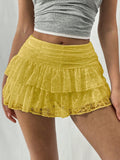 Kanten minirok met ruches en ingebouwd shortje – Melina