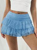 Kanten minirok met ruches en ingebouwd shortje – Melina