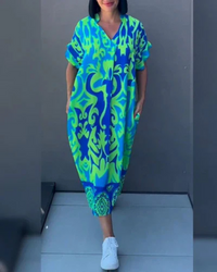 Elegante bloemenjurk met vrouwelijke pasvorm – Emma