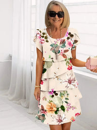 Maxi bloemenjurk met afslankend watervaldesign – Noémie