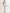 Gebreide Maxi Jurk met Open Rug en Bloemendetails – Luna